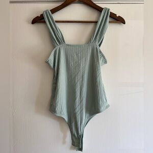 Vestique Ribbed Bodysuit